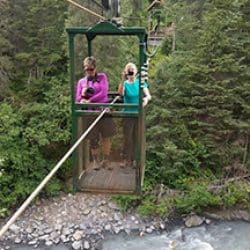 two people in a chair in alaska