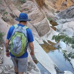 man hiking through big bend
