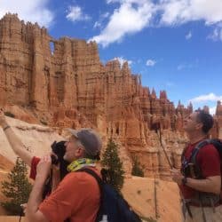 Hikers gaze at the rock formations in Bryce Canyon National Park on the Peekaboo Loop Trail