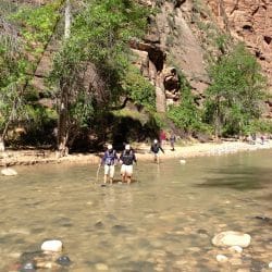 people in a river canyon