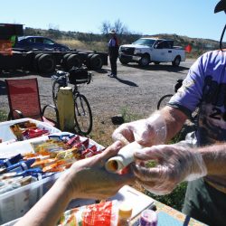 man passing out snacks
