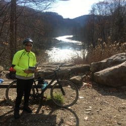 biker next to the great allegheny passage