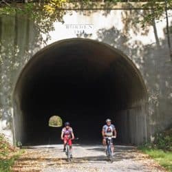 large tunnel with bikers