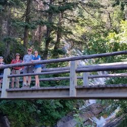hikers on a bridge