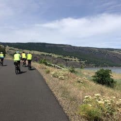 bike riders on a country road