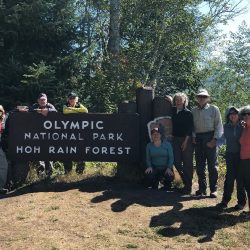 Hikers gather at the entrance to Olympic National Park