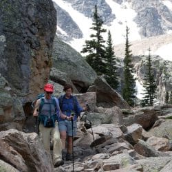 Two hikers on the rocky mountains