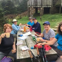 hikers enjoying a picnic lunch