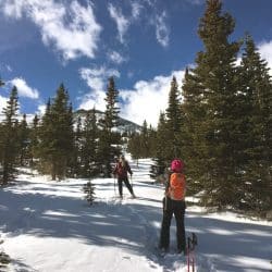 snowshoe hiking through the rocky mountains
