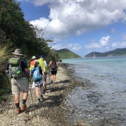 hikers along the ocean