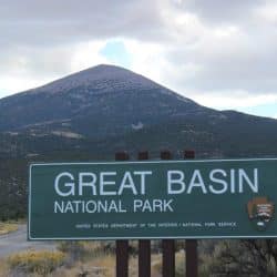 Great Basin National Park sign in front of mountain peak
