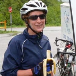 Biker smiles for photo on bike tour
